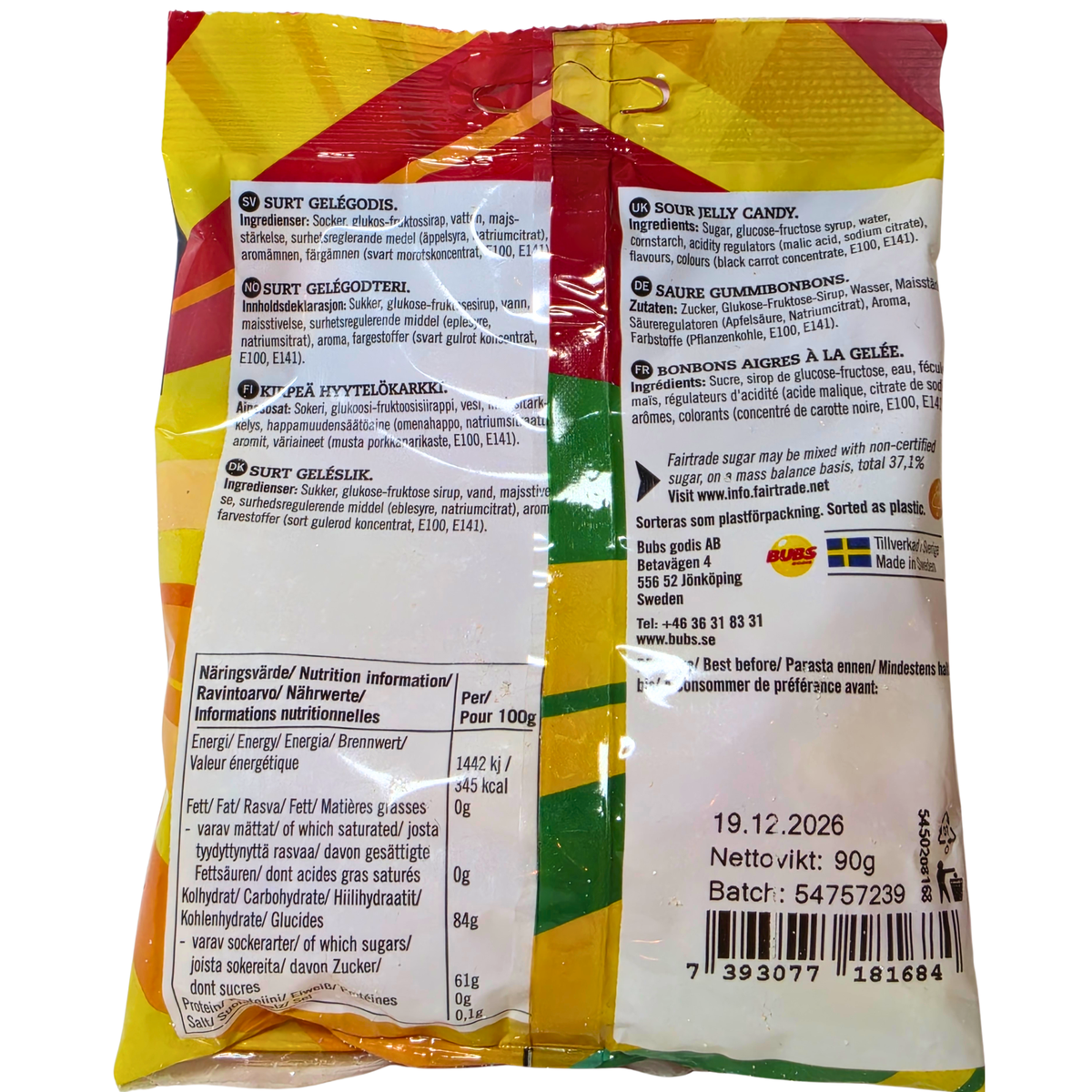 Back of a packaged food product showing bilingual Swedish and English nutrition facts, ingredients, and barcode on a yellow, red, and green printed package.